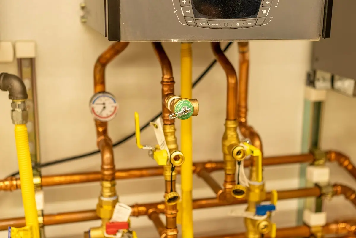 Licensed technician providing Backflow Prevention for a homeowner in Anoka